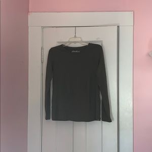 Long sleeve green tee shirt.